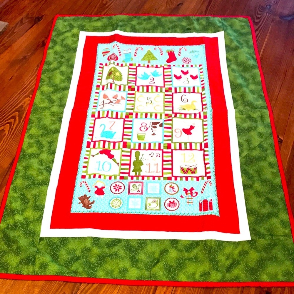 Handmade Quilt with Jim Shore 12 Days of Christmas fabric.